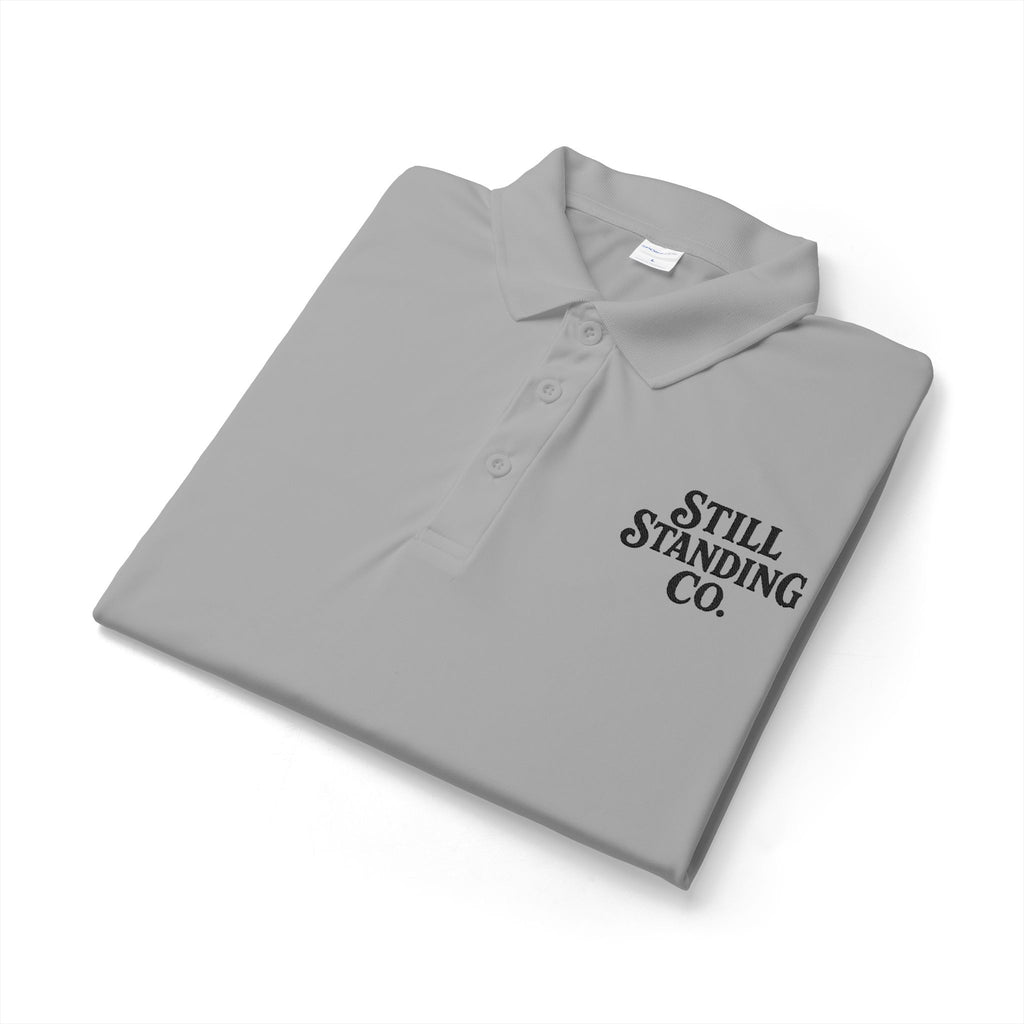 Still Standing Co. Polo Shirt — Embroidered Logo Performance Polo